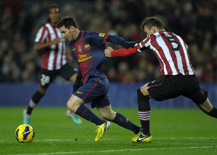 Messi, durante un enfrentamiento reciente con el Athletic. (Lluis GENE /AFP)