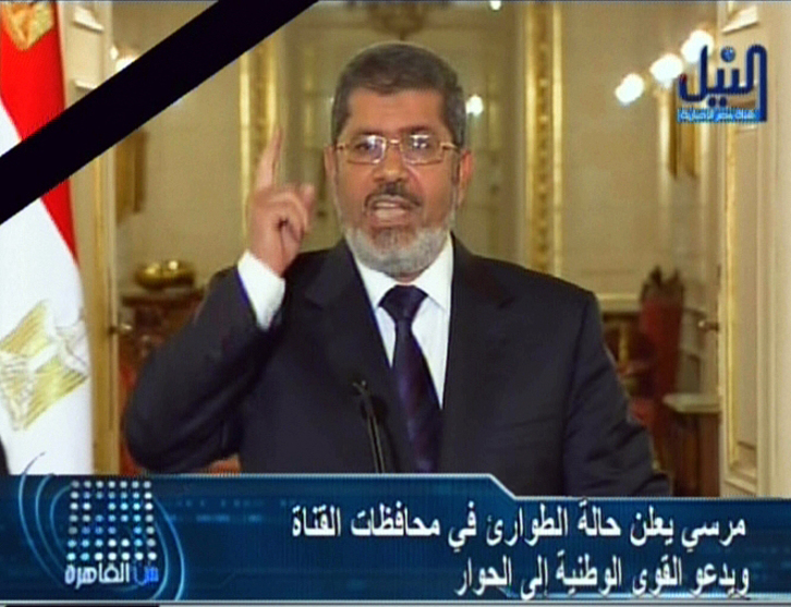 Imagen captada de la televisión durante el discurso de Mohamed Morsi. (AFP)