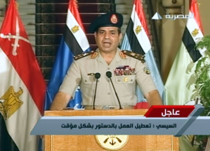 El jefe del Ejército, durante la lectura de la declaración por la que se consuma el golpe de Estado. (AFP PHOTO)