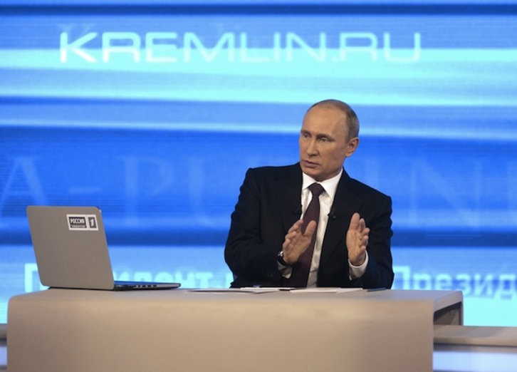Vladimir Putin, durante su intervención televisiva. (Alexei NIKOLSKY / AFP PHOTO)