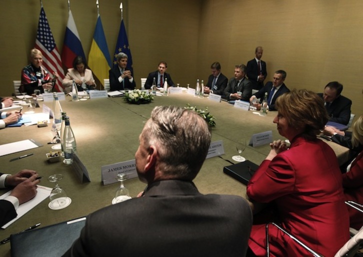 Las cuatro delegaciones, durante su cumbre en Ginebra. (Jim BOURG / AFP PHOTO)